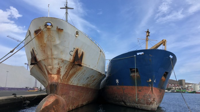 Old and rusty ships in a port