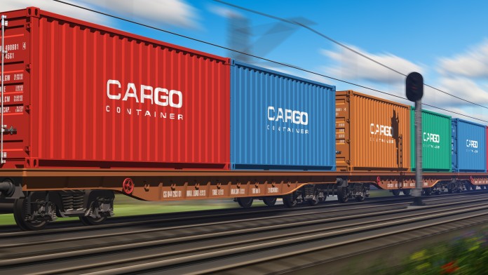 Freight train with cargo containers passing by