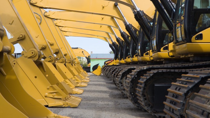 row of excavators