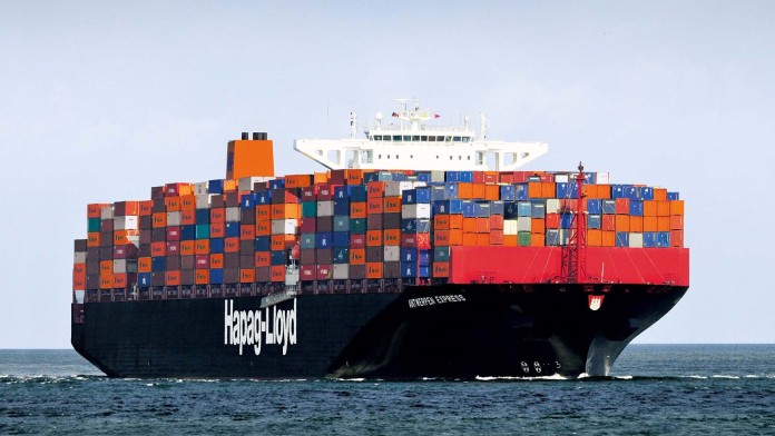 huge container ship on the sea loaded with containers