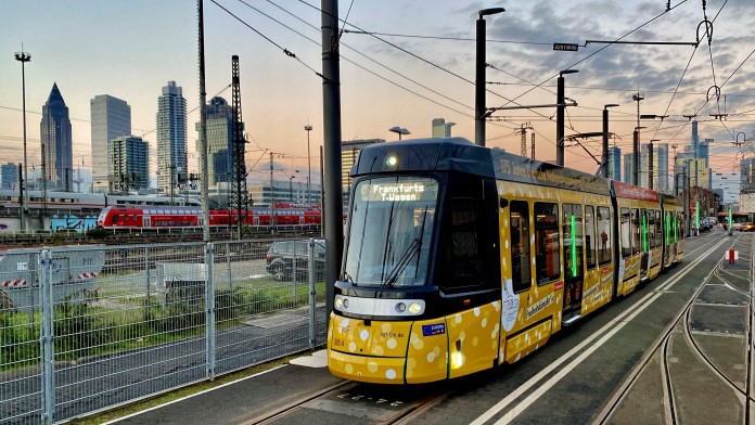 modern trams with Frankfurt skyline in the background